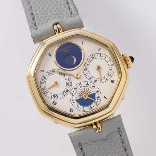 Gerald Genta “Succes “ Day date calendar moonphase with cream dial in 18 k yellow gold ref G2747